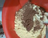 A picture of step 2 of Marie Cocoa balls with almonds inside.