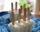 A picture of step 3 of Coconut Popsicles.