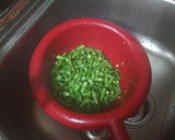 Foto del paso 2 de la receta: Habichuelas compuestas con carne de cochino, papas fritas y huevo duro