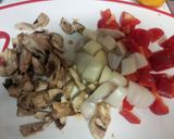 A picture of step 3 of Skillet fried sausage, mushrooms, peppers and onion with egg.