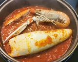 Foto del paso 9 de la receta: Calamar relleno de sus tentáculos, aletas y Cigala