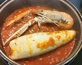 Foto del paso 9 de la receta: Calamar relleno de sus tentáculos, aletas y Cigala