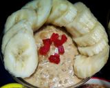 A picture of step 7 of Doodh daliya in pressure cooker (with different toppings).