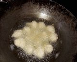A picture of step 2 of Special sindhi sweet (moong dal vadii in milk).