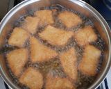 A picture of step 10 of Crunchy soft Mandazi with cinammon and orange rind.