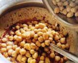 A picture of step 3 of Chickpea curry (chana masala curry).