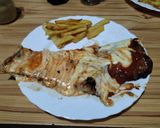 Foto del paso 3 de la receta: Matambre a la pizza a la parrilla con papas fritas