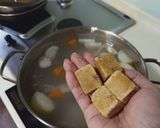 A picture of step 4 of Chicken Pho with Instant Seasoning Cubes.