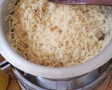 A picture of step 1 of Fried rice with chicken curry.