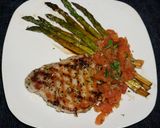 A picture of step 5 of Grilled Pork Tenderloin Medallions with Fresh Tomato Sauce and Roasted Asparagus, Jon Style.
