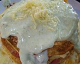 Foto del paso 2 de la receta: Torre de panqueques de choclo, jamón y queso