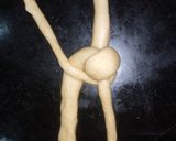 A picture of step 5 of Braided egg buns.