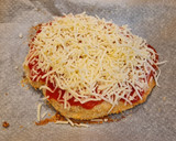 Foto del paso 4 de la receta: Pollo a la napolitana con copos de patata