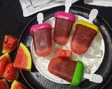 A picture of step 4 of Watermelon Ice Popsicles.