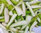 A picture of step 1 of Snake Gourd Sabji.