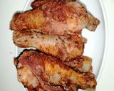 A picture of step 5 of Honey and ketchup glanced chicken drumsticks.