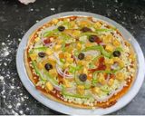 A picture of step 21 of Paneer Palangtod Pizza.