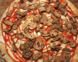 Foto del paso 9 de la receta: Pizza de hojaldre con ternera picada y champiñones
