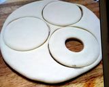 A picture of step 2 of White chocolate donuts.