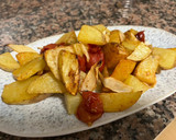 Foto del paso 3 de la receta: Patatas en airfryer con tomates cherry y cebolla