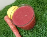 A picture of step 3 of Apple Pomegranate carrot detox juice.