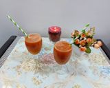 A picture of step 1 of Orange and carrot juice.