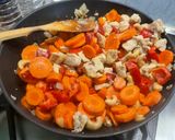 A picture of step 19 of Chicken with Cashews, Bell Peppers, and Carrots.