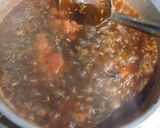 A picture of step 8 of Brain Masalah with tomatoes.