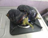 A picture of step 1 of Vanga bharit (Baingan bharta).