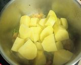 Foto del paso 3 de la receta Patatas con migas de bacalao