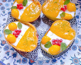 Foto del paso 9 de la receta: Mangos 🥭 rellenos de mousse de coco 🥥