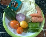 A picture of step 3 of Rice with carrot and sauce.