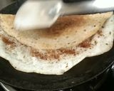 A picture of step 3 of Crispy dosa in iron tawa.