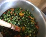 A picture of step 4 of Bhindhi with tali hui sabz mirchain and thandi lassi.