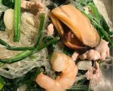 A picture of step 5 of Super Healthy Cellophane noodles with shrimps mussels pork fried vegetables.