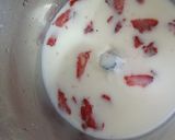 A picture of step 2 of Fresh Strawberry milk shake.