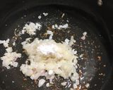 A picture of step 4 of Brinjal bharta.