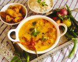 A picture of step 14 of Curd Kadhi (pakoda curry/ kadhi).