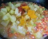 A picture of step 1 of Prawns with Potato and Green Peas.
