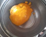 A picture of step 3 of Palm dumplings stuffed with sweetened coconut.
