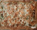 Une image de l'étape 2 de Pizza blanche au saumon fumé au Cook Expert.