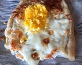 A picture of step 4 of Egg cheese pita.