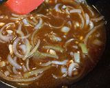 A picture of step 3 of Calamari stewed in Tomatoes.