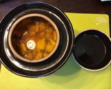 A picture of step 3 of California Farm Green Mangos Pickled in Pepper Oil.