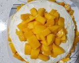 A picture of step 7 of Mango crêpe cake.