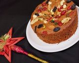 एगलेस फ्रूट प्लम केक ऑन गैस स्टोव (Eggless Fruit Plum Cake On Gas Stove ki recipe in hindi) रेसिपी चरण 17 फोटो