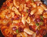 A picture of step 5 of Mexican chicken enchiladas.