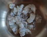 A picture of step 1 of Prawns Coconut Recipe Prawns Thengakoth Coconut slices ularth.