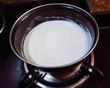 A picture of step 2 of Homemade Condensed Milk.