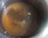 A picture of step 3 of Herbal Jaggery Tea.